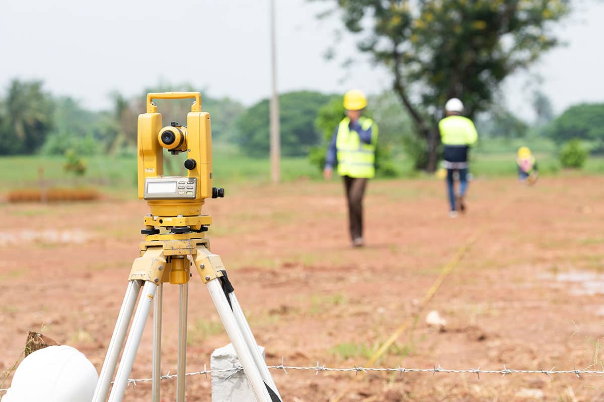Workers and survey equipment