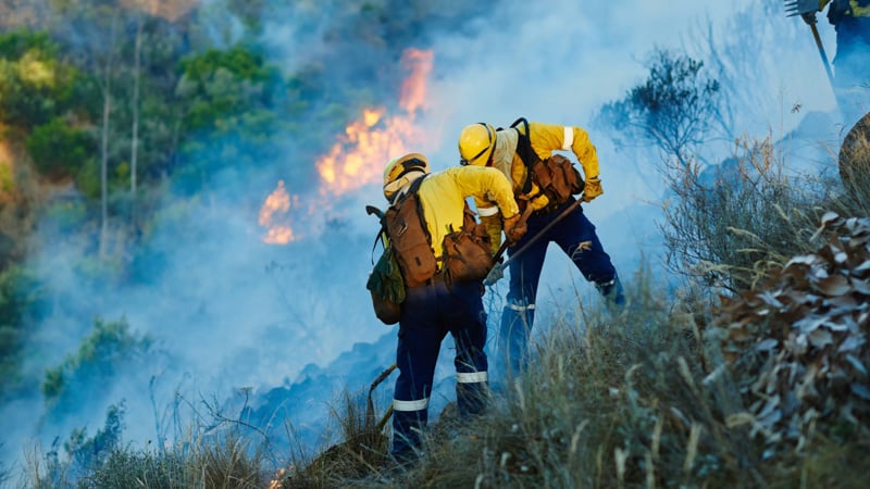 Emergency Responders pushing back the flames